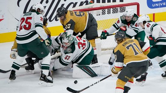 Apr-3-2021-Las-Vegas-Nevada-USA-Minnesota-Wild-goaltender-Cam-Talbot-33-makes-a-save-against-the-Veg